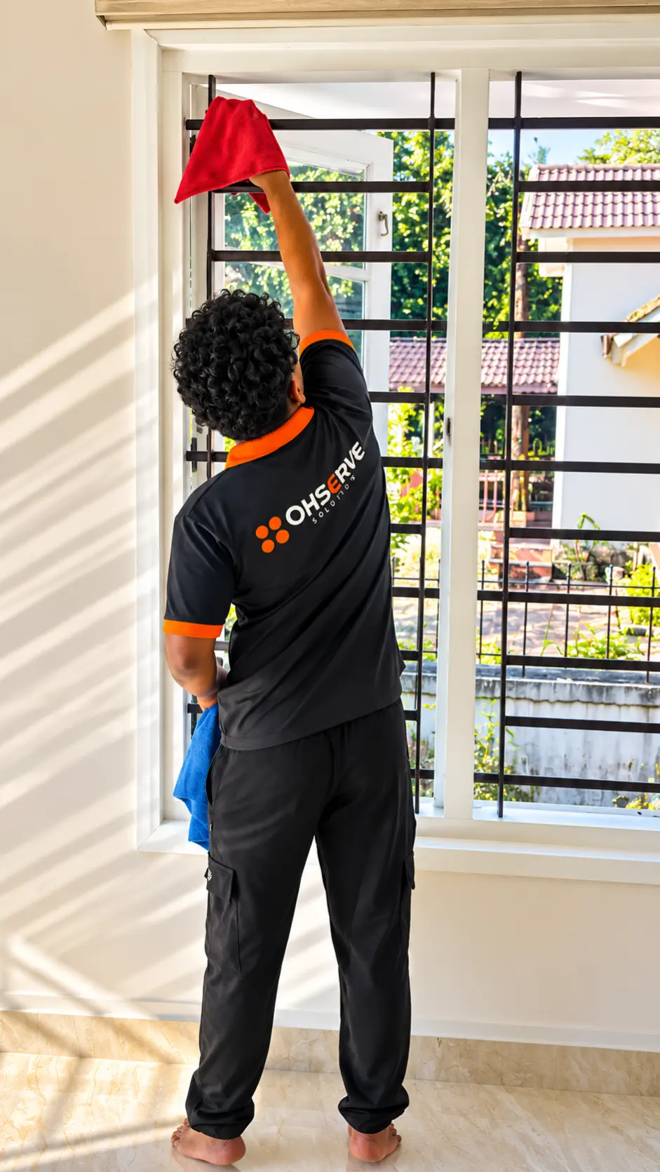 OhServe staff member repairing a kitchen fixture